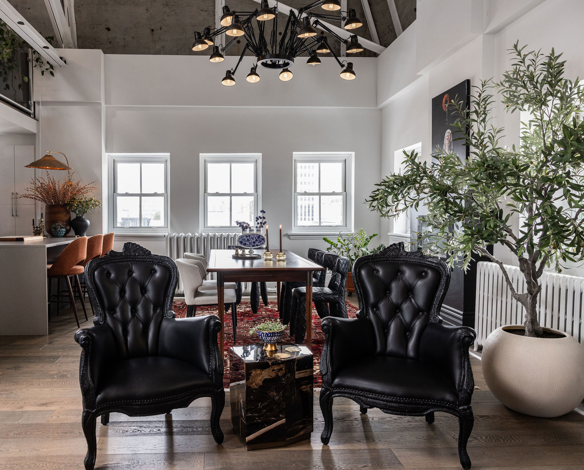 Smoke armchairs by Moooi in Amsterdam-inspired loft living room