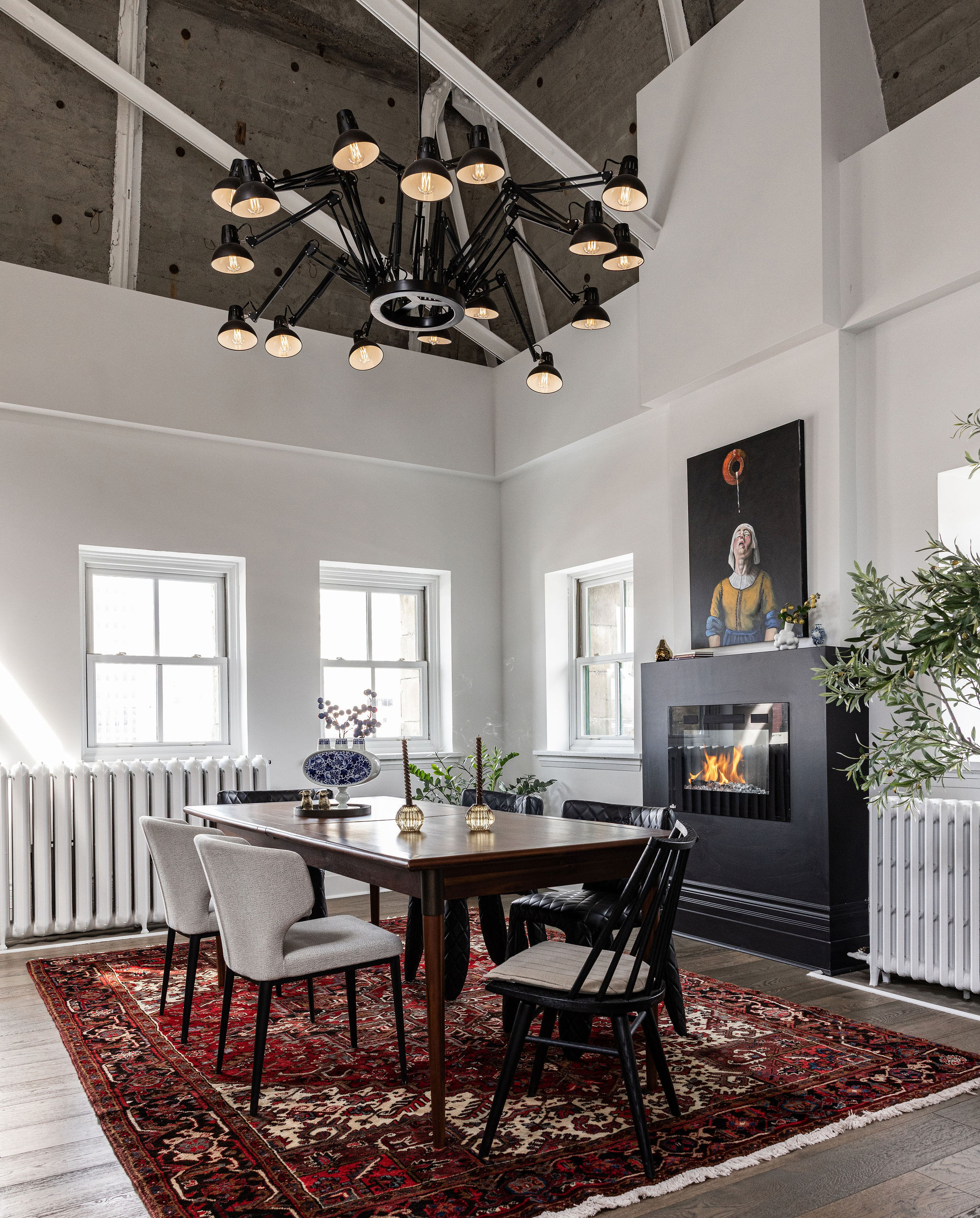 Dining room in Amsterdam-inspired Saint John loft with Dear Ingo chandelier