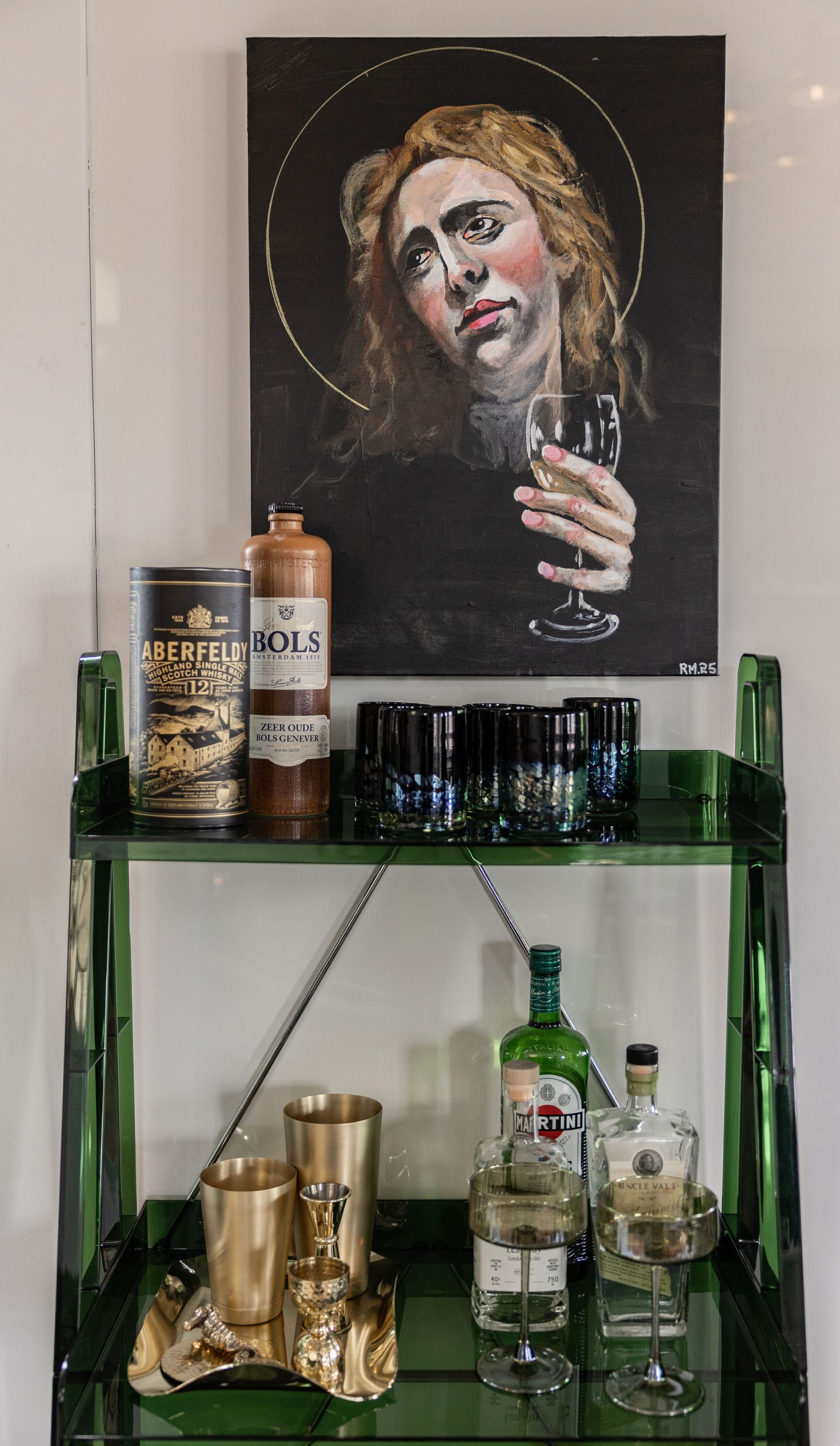 Mini bar with Dutch glassware in Amsterdam-inspired interior design loft